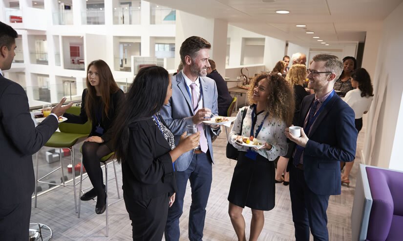 chatting at a business networking lunch